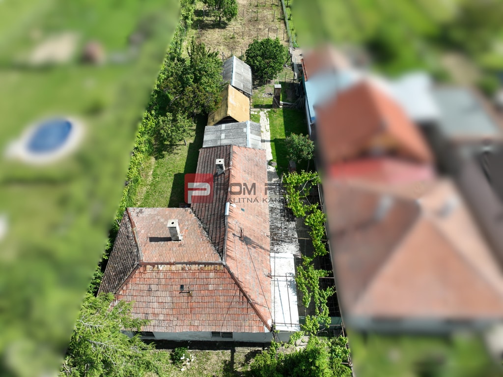 Na PREDAJ veľkorysý pozemok so starším domom v obci Dolné Orešany 4